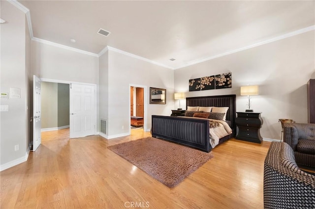 8905 Saint Cloud Ln, Bakersfield, CA 93311 - bedroom with light wood finished floors and ornamental molding