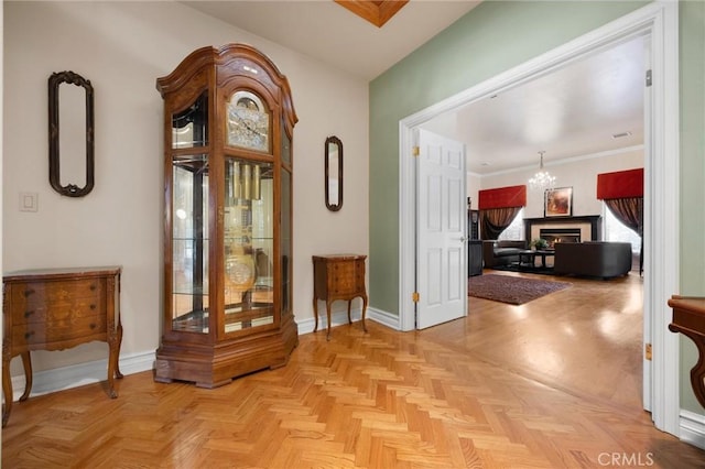 8905 Saint Cloud Ln, Bakersfield, CA 93311 - hall with baseboards and a chandelier