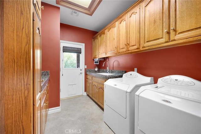 8905 Saint Cloud Ln, Bakersfield, CA 93311 - laundry area with cabinet space and washing machine and dryer