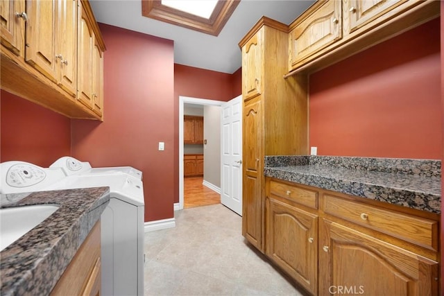 8905 Saint Cloud Ln, Bakersfield, CA 93311 - washroom with cabinet space and washer and dryer