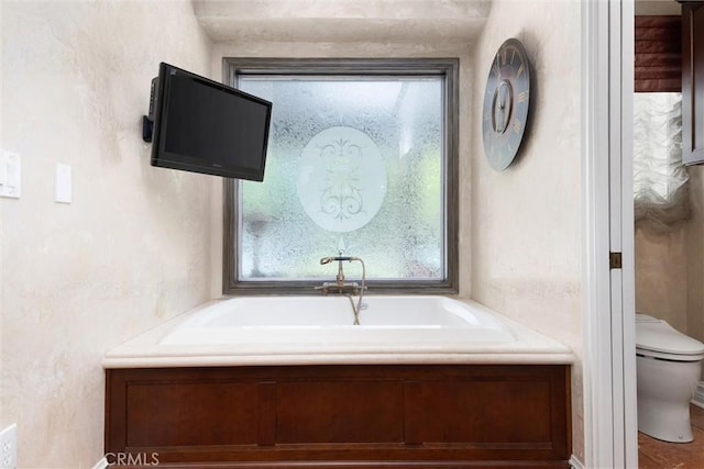 8905 Saint Cloud Ln, Bakersfield, CA 93311 - full bathroom with toilet and a garden tub