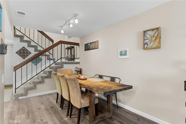 1330 W Apricot Ave, Lompoc, CA 93436 - dining area featuring stairs and wood finished floors