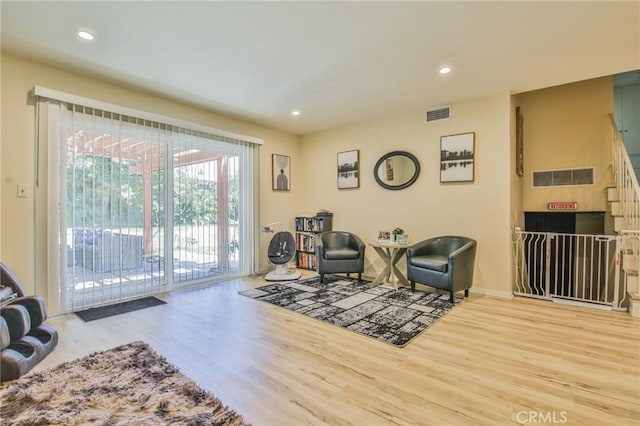 15339 Regalado St, Hacienda Heights, CA 91745 - sitting room with wood finished floors and recessed lighting