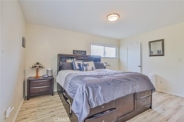 15339 Regalado St, Hacienda Heights, CA 91745 - bedroom with light wood-type flooring and baseboards