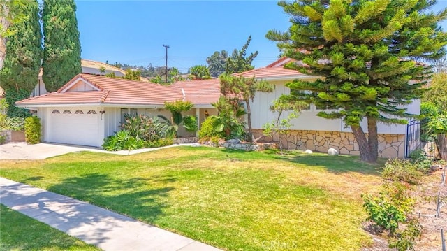 15339 Regalado St, Hacienda Heights, CA 91745 - view of front of property with a garage, a front lawn, and a tiled roof