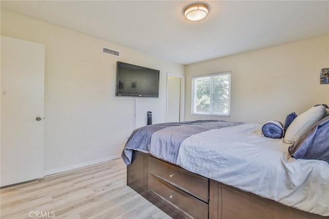 15339 Regalado St, Hacienda Heights, CA 91745 - bedroom with light wood-style flooring and baseboards