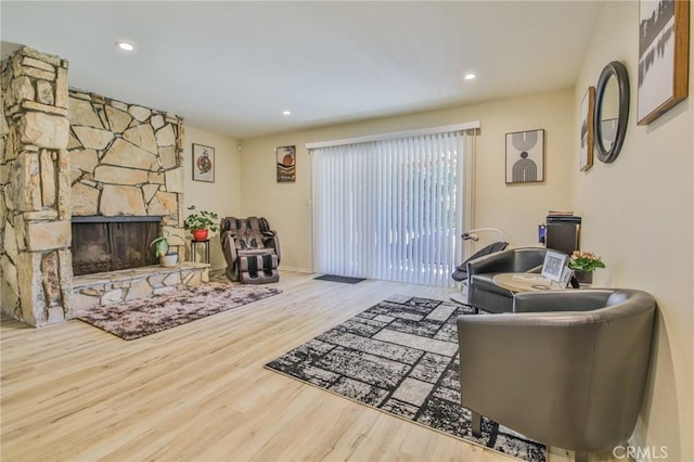 15339 Regalado St, Hacienda Heights, CA 91745 - living area featuring wood finished floors, a fireplace, and recessed lighting