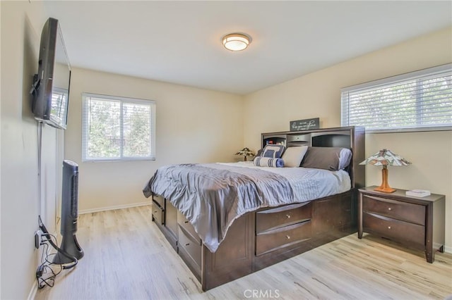 15339 Regalado St, Hacienda Heights, CA 91745 - bedroom with multiple windows and wood finished floors