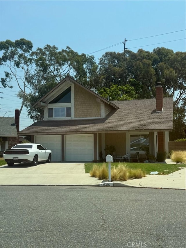 6316 E Woodsboro Ave, Anaheim, CA 92807 - view of front facade with a garage, a shingled roof, driveway, and a chimney