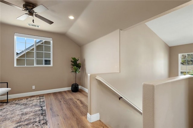 7 Sachem Way, Ladera Ranch, CA 92694 - unfurnished room featuring an upstairs landing, lofted ceiling, wood finished floors, recessed lighting, and ceiling fan