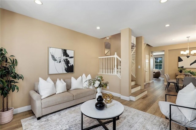 7 Sachem Way, Ladera Ranch, CA 92694 - living area with stairs, wood finished floors, a chandelier, and recessed lighting