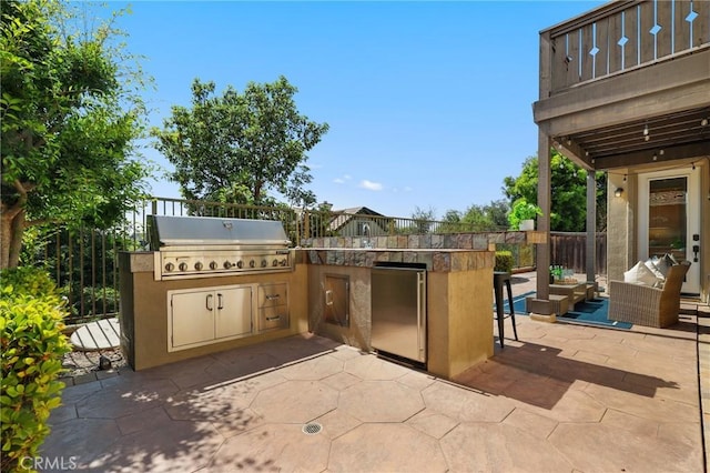 7 Sachem Way, Ladera Ranch, CA 92694 - view of patio / terrace featuring exterior kitchen and an outdoor living space