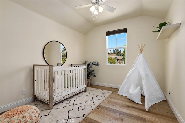 7 Sachem Way, Ladera Ranch, CA 92694 - bedroom featuring wood finished floors, lofted ceiling, and ceiling fan