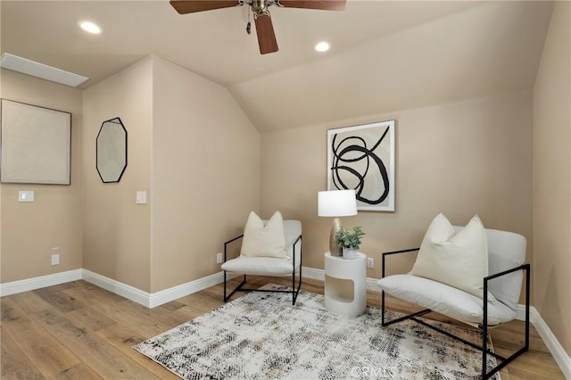 7 Sachem Way, Ladera Ranch, CA 92694 - living area featuring ceiling fan, wood finished floors, vaulted ceiling, and recessed lighting