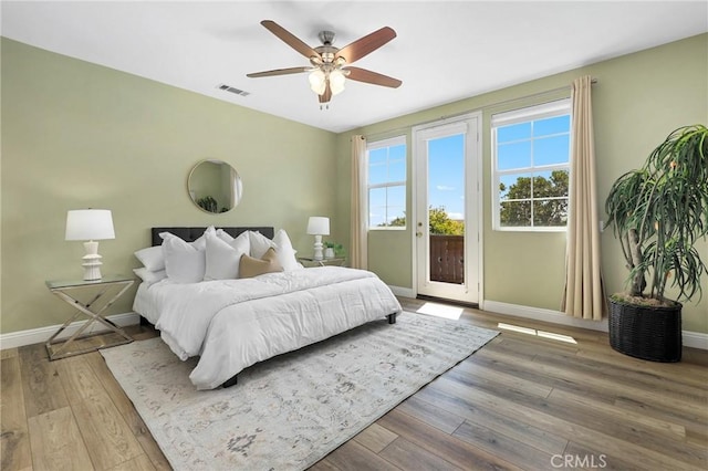 7 Sachem Way, Ladera Ranch, CA 92694 - bedroom with access to outside, wood finished floors, and a ceiling fan