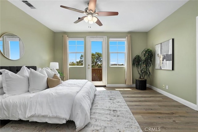 7 Sachem Way, Ladera Ranch, CA 92694 - bedroom with access to exterior, wood finished floors, and ceiling fan