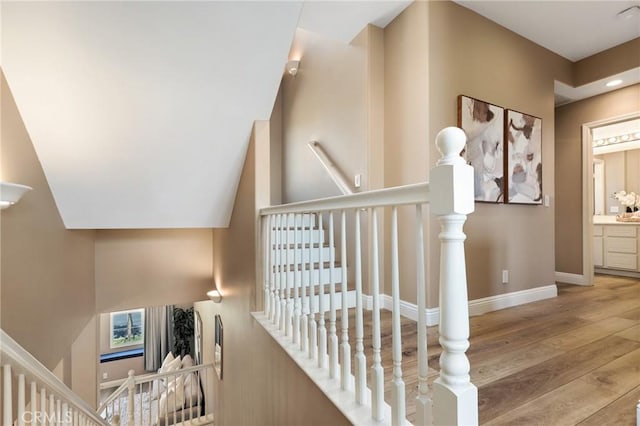 7 Sachem Way, Ladera Ranch, CA 92694 - staircase featuring wood finished floors and baseboards