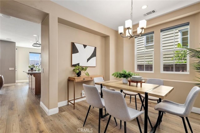 7 Sachem Way, Ladera Ranch, CA 92694 - dining space with a chandelier, light wood-style floors, and recessed lighting