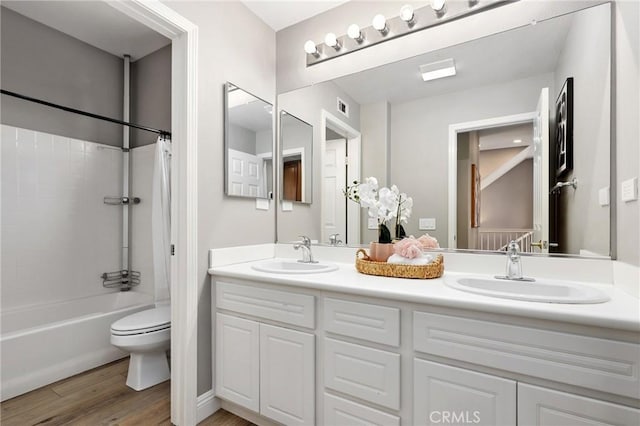 7 Sachem Way, Ladera Ranch, CA 92694 - full bathroom with double vanity, wood finished floors, and shower / bathtub combination with curtain