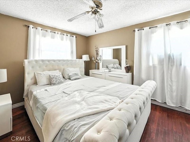 20319 Vanowen St, Winnetka, CA 91306 - bedroom featuring dark wood-type flooring, ceiling fan, and a textured ceiling