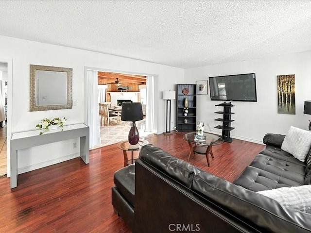 20319 Vanowen St, Winnetka, CA 91306 - living room with wood finished floors and a textured ceiling