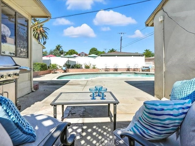 20319 Vanowen St, Winnetka, CA 91306 - view of swimming pool featuring a fenced backyard, grilling area, and a patio area