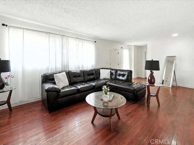 20319 Vanowen St, Winnetka, CA 91306 - living area with hardwood / wood-style flooring and a textured ceiling