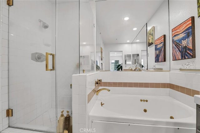 5224 Zelzah Ave Unit 208, Encino, CA 91316 - full bathroom with a tub with jets, a shower stall, and recessed lighting