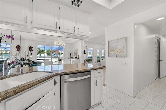 5224 Zelzah Ave Unit 208, Encino, CA 91316 - kitchen featuring stainless steel dishwasher, light tile patterned floors, a chandelier, white cabinets, and recessed lighting