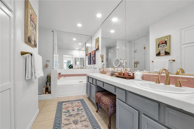 5224 Zelzah Ave Unit 208, Encino, CA 91316 - full bath with double vanity, a stall shower, a bath, recessed lighting, and tile patterned floors