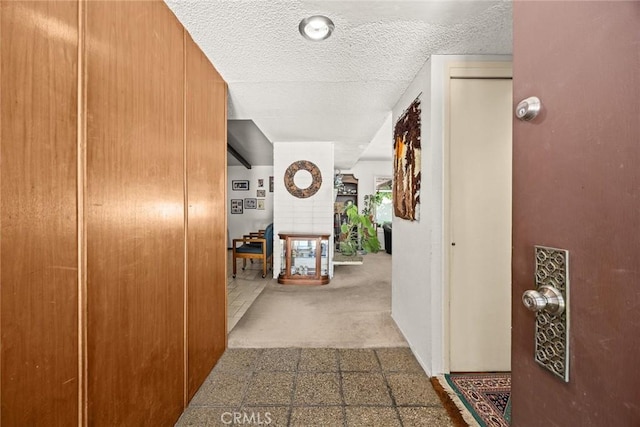 2912 Fragancia Ave, Hacienda Heights, CA 91745 - corridor featuring a textured ceiling and carpet flooring