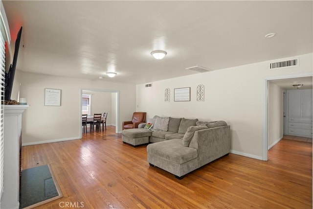 33 Miner St, Bakersfield, CA 93305 - living room with light wood finished floors and baseboards