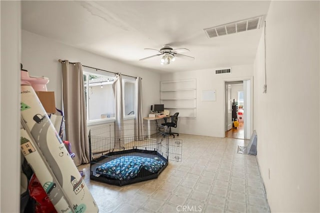 33 Miner St, Bakersfield, CA 93305 - game room with a desk and ceiling fan