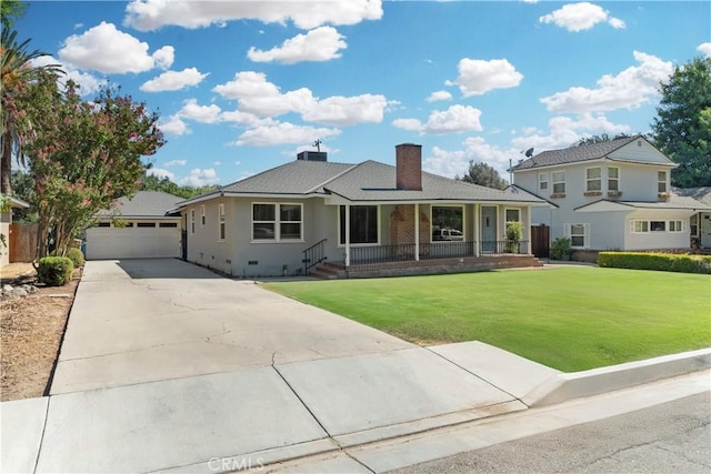 33 Miner St, Bakersfield, CA 93305 - view of front of home featuring a chimney, a porch, a garage, a front lawn, and brick siding