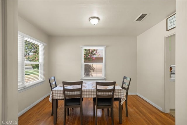 33 Miner St, Bakersfield, CA 93305 - dining room with wood finished floors and baseboards