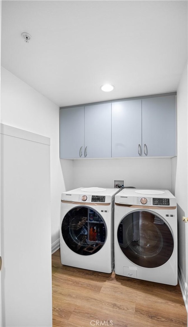 565 E San Jose Ave Unit 204, Burbank, CA 91501 - laundry area featuring washer and dryer, cabinet space, light wood finished floors, and recessed lighting