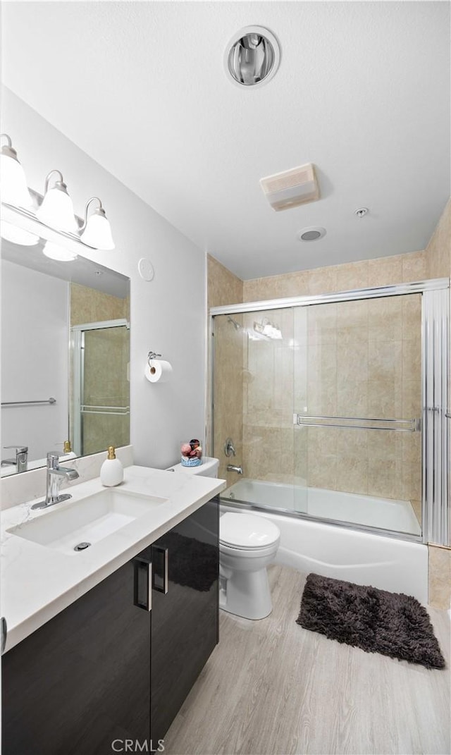 565 E San Jose Ave Unit 204, Burbank, CA 91501 - full bath with vanity, shower / bath combination with glass door, and wood finished floors