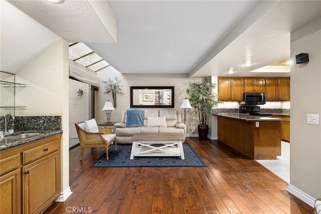 1610 Via Estrella, Pomona, CA 91768 - living room featuring hardwood / wood-style floors and a raised ceiling
