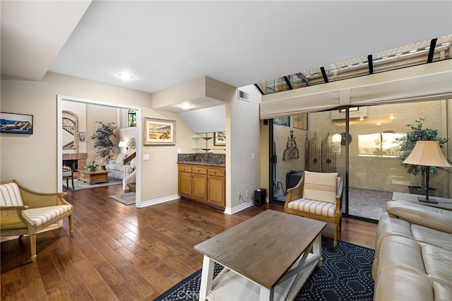 1610 Via Estrella, Pomona, CA 91768 - living room featuring dark wood-type flooring and baseboards