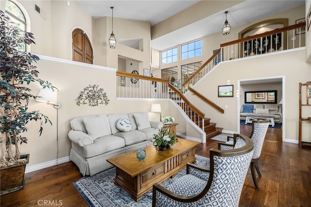 1610 Via Estrella, Pomona, CA 91768 - living area featuring a towering ceiling, wood-type flooring, and stairway