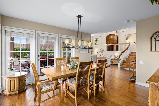 1610 Via Estrella, Pomona, CA 91768 - dining area featuring hardwood / wood-style floors, a chandelier, and stairs