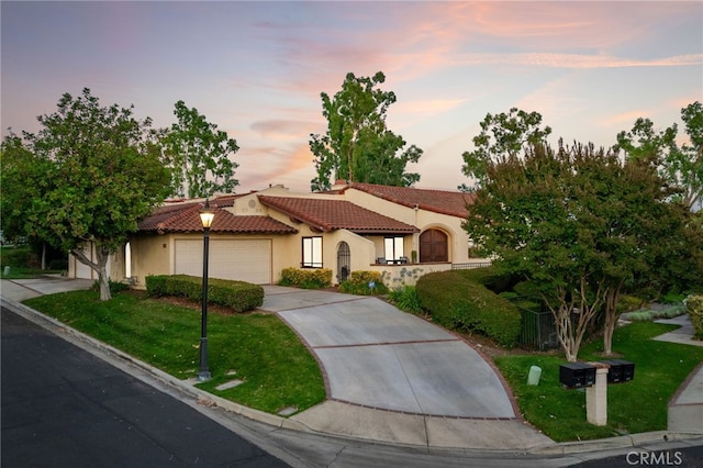1610 Via Estrella, Pomona, CA 91768 - mediterranean / spanish-style home with a tiled roof, stucco siding, a garage, and concrete driveway