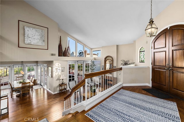 1610 Via Estrella, Pomona, CA 91768 - entryway with plenty of natural light, high vaulted ceiling, dark wood finished floors, and french doors