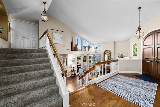 1610 Via Estrella, Pomona, CA 91768 - foyer with wood-type flooring, stairs, and high vaulted ceiling