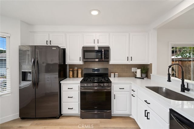 3705 Cypress Ln, Yorba Linda, CA 92886 - kitchen with stainless steel appliances, white cabinetry, light countertops, and recessed lighting