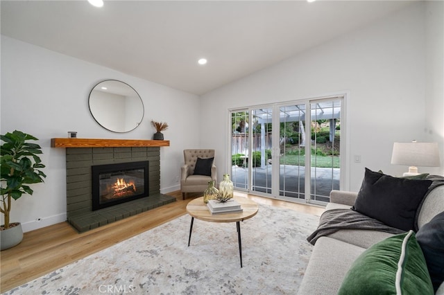 3705 Cypress Ln, Yorba Linda, CA 92886 - living room with lofted ceiling, a brick fireplace, recessed lighting, and wood finished floors