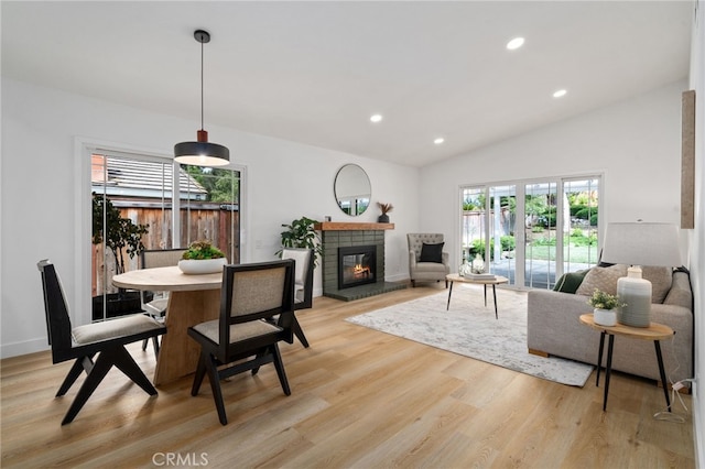 3705 Cypress Ln, Yorba Linda, CA 92886 - dining area featuring light wood finished floors, a tile fireplace, recessed lighting, and vaulted ceiling