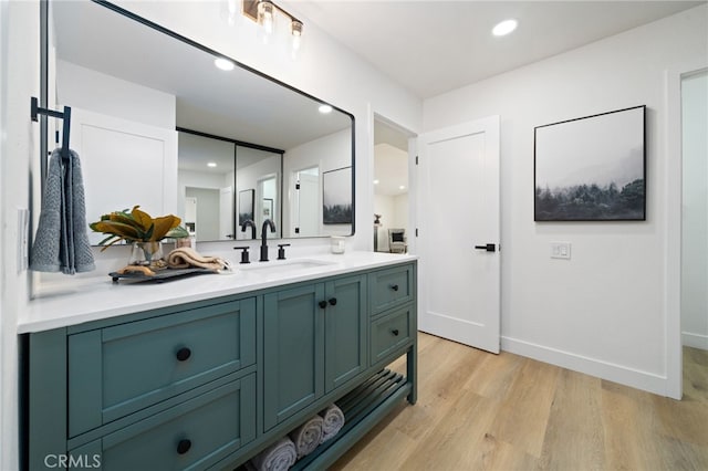 3705 Cypress Ln, Yorba Linda, CA 92886 - bathroom with wood finished floors, vanity, and recessed lighting