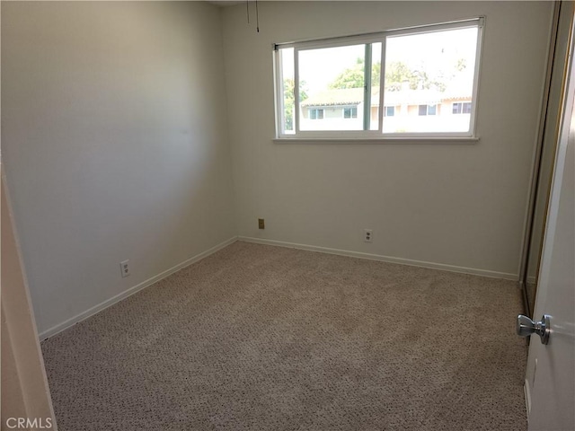 17077 Los Modelos St, Fountain Valley, CA 92708 - carpeted empty room with baseboards