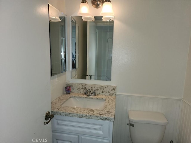 17077 Los Modelos St, Fountain Valley, CA 92708 - half bathroom with vanity and wainscoting